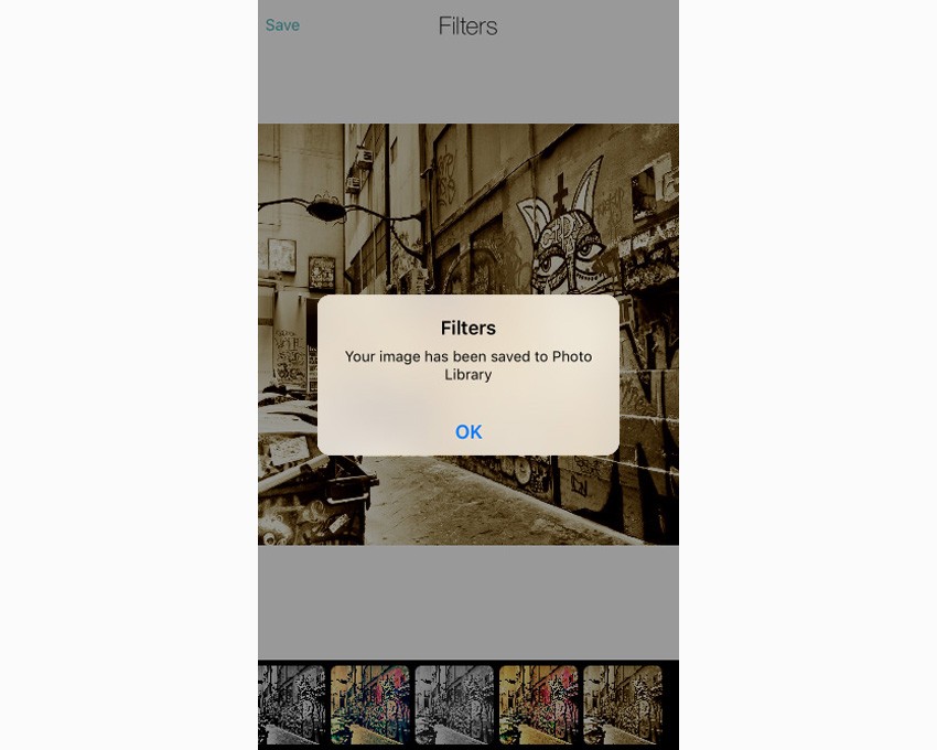 App showing message that image has been saved to Photo Library