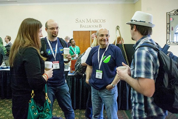 Collis, Cyan, and Fuad Ta'eed chatting with Aaron Campbell at PressNomics 2012