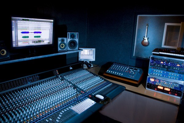 A music studio with lots of gear